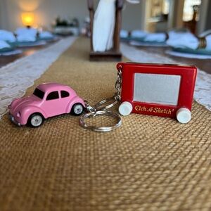 Vintage Pink Volkswagen Beetle Car and Red Etch A Sketch Keychain Set